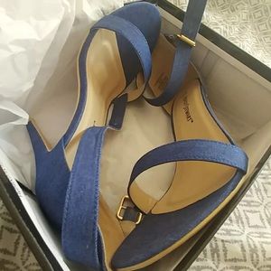 A pair of denim high heels shoes size 12 women